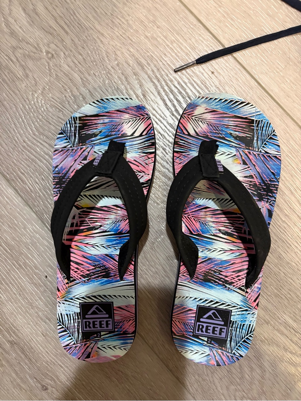 Reef Kids Flip Flops with Black Straps and Pink & Blue Palm Print